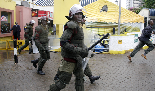 Police chase rioting groups within the Nairobi business district (photo: DEMOSH)